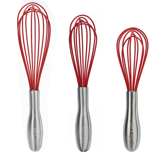 Three red silicone whisks with silver handles