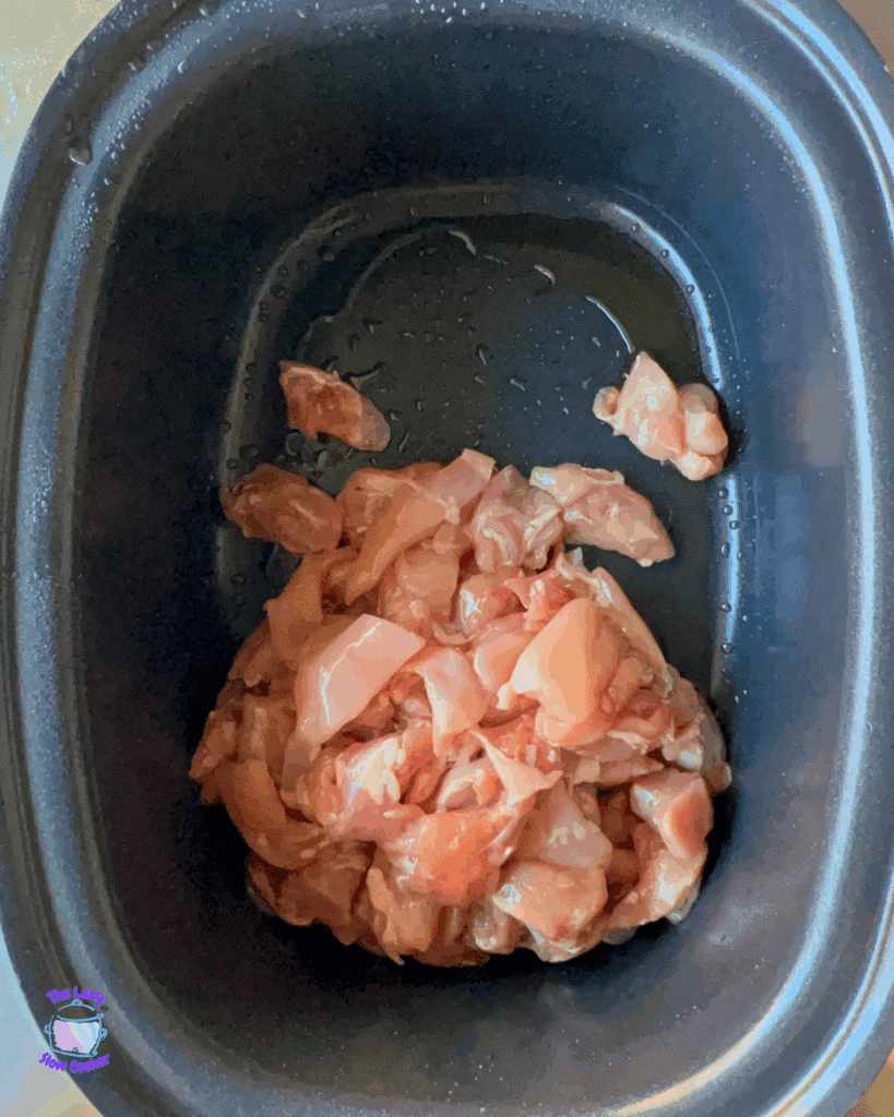 raw chicken in a slow cooker