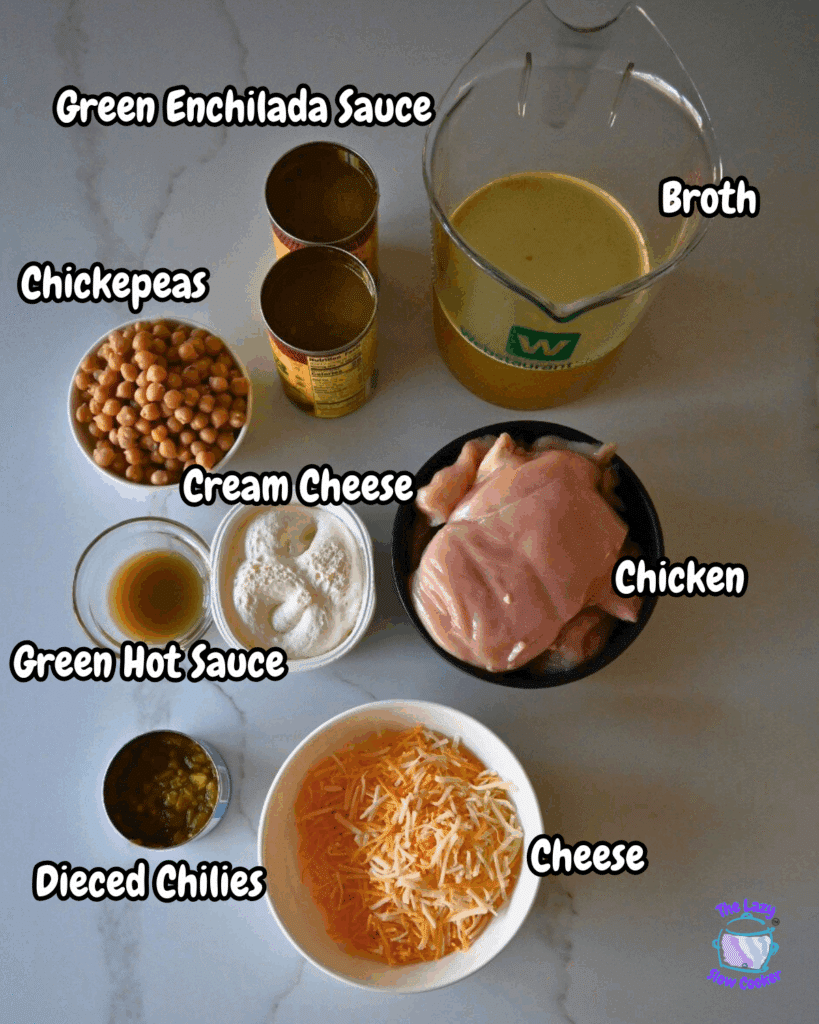 A countertop displays labeled ingredients: green enchilada sauce, broth, chickpeas, cream cheese, chicken breast, green hot sauce, diced chilies, and shredded cheese.