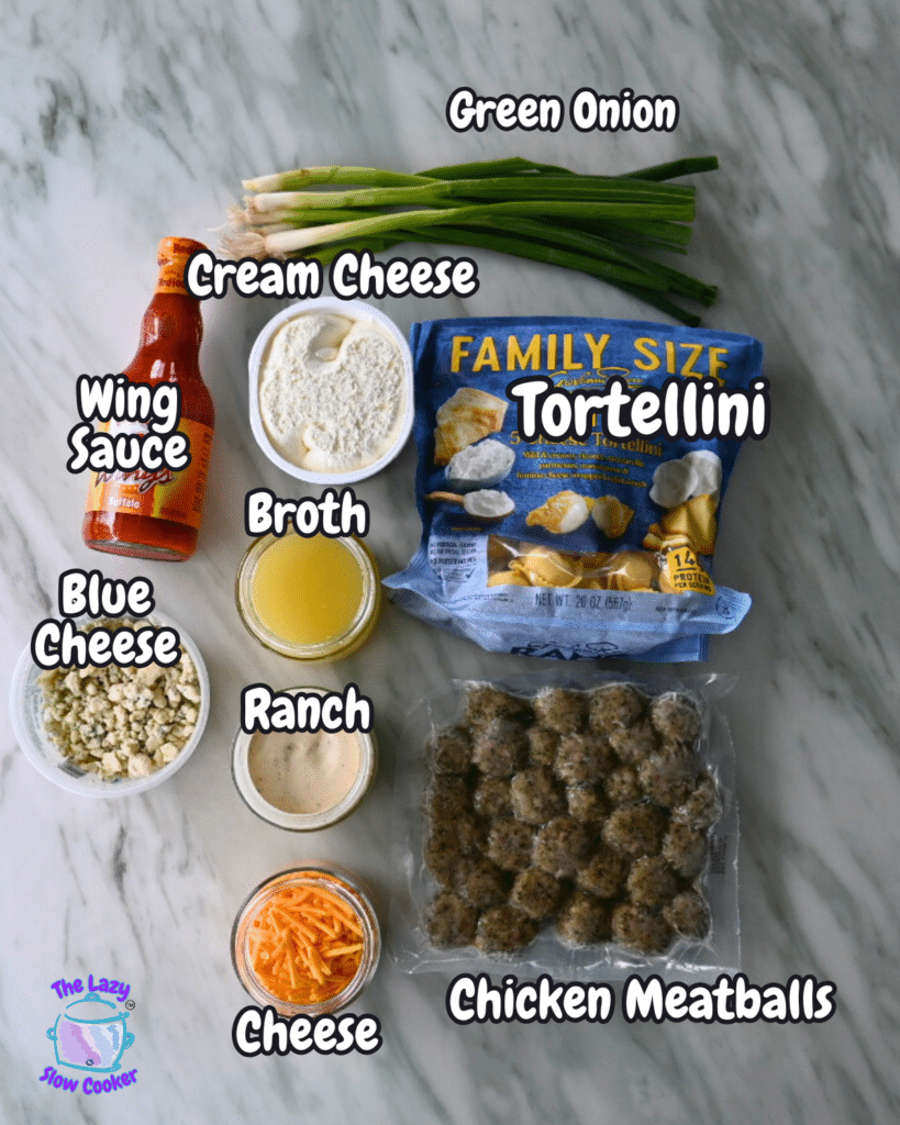 Buffalo chicken tortellini ingredients—green onions, cream cheese, wing sauce, cheese, broth, ranch, tortellini, and meatballs.