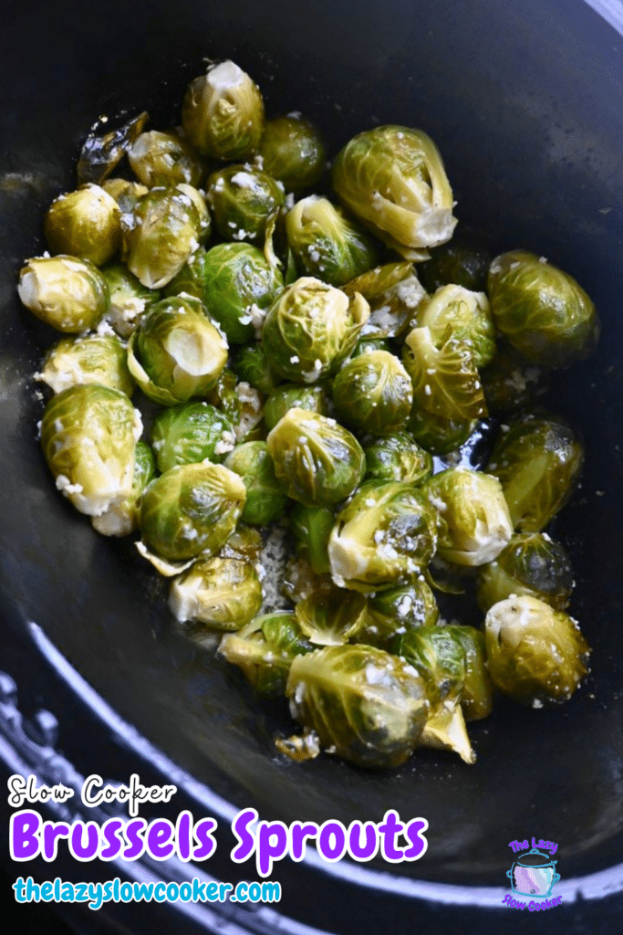 Brussels sprouts in a slow cooker, lightly browned and topped with chopped garlic. Text reads "Slow Cooker Brussels Sprouts.