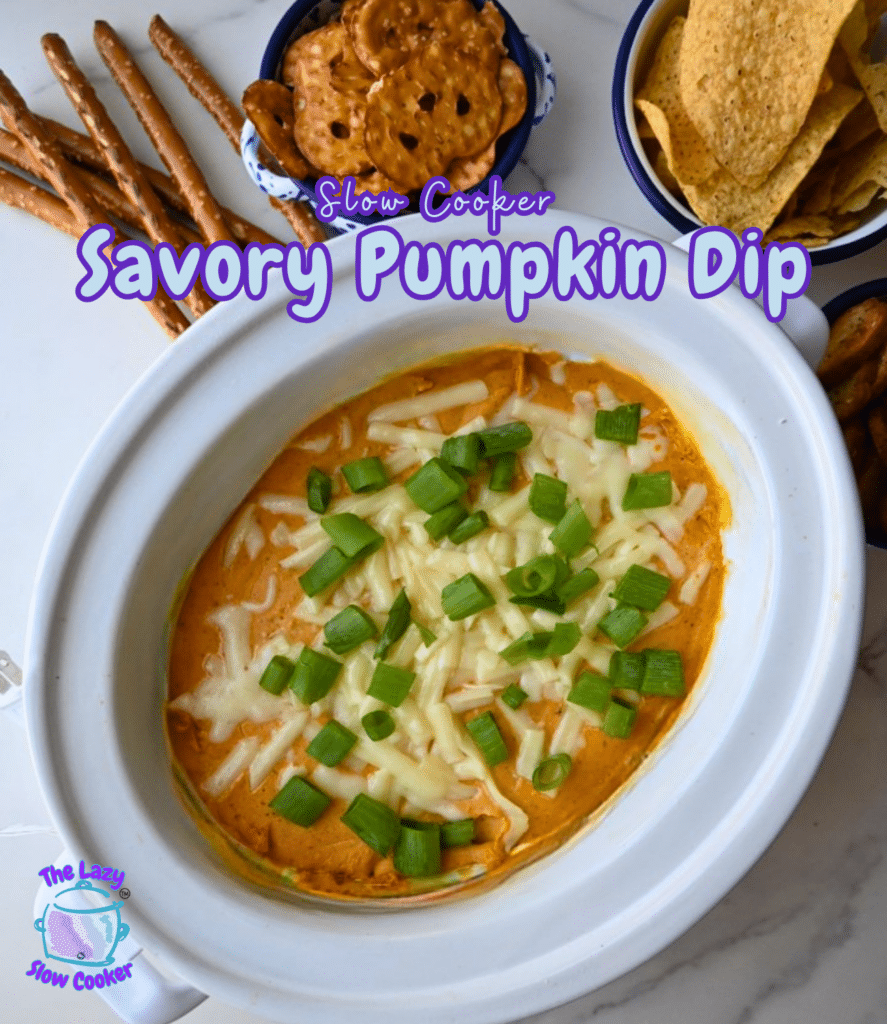 A slow cooker holds pumpkin dip topped with melted cheese and sliced green onions, with pretzels, chips, and crackers arranged around it. The text says “Slow Cooker Savory Pumpkin Dip.”.